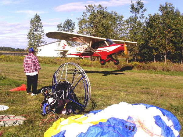 Plane taking off inches from spectators