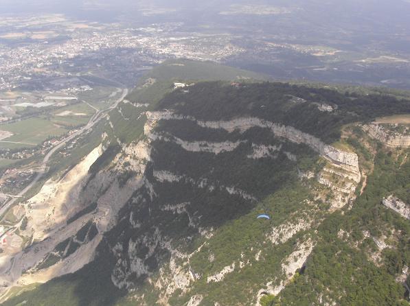 Jason Andrews paragliding low over Saleve